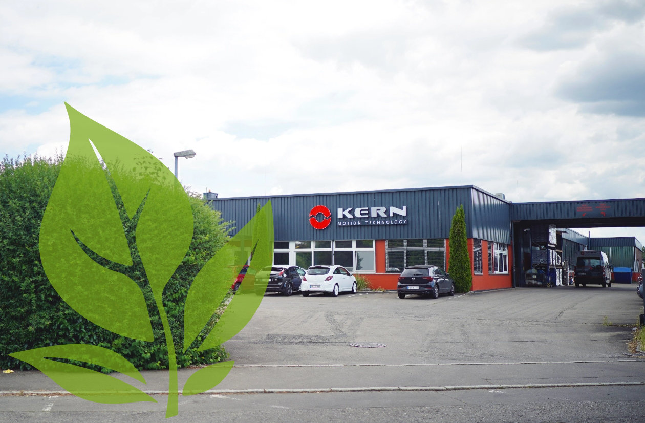 Gebäude Kern Antriebstechnik mit Blatt als Nachhaltigkeitszeichen